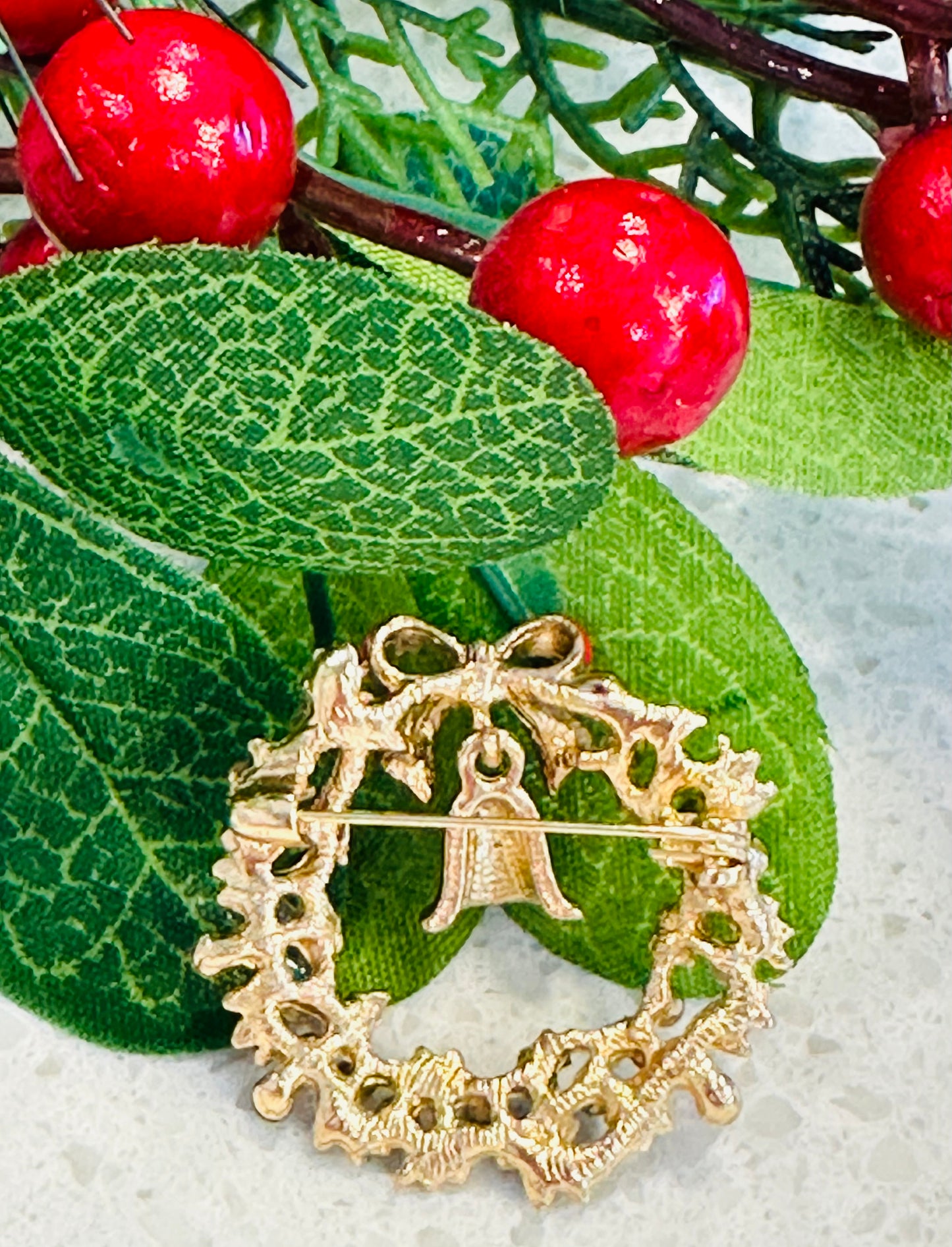 Wreath bell brooch