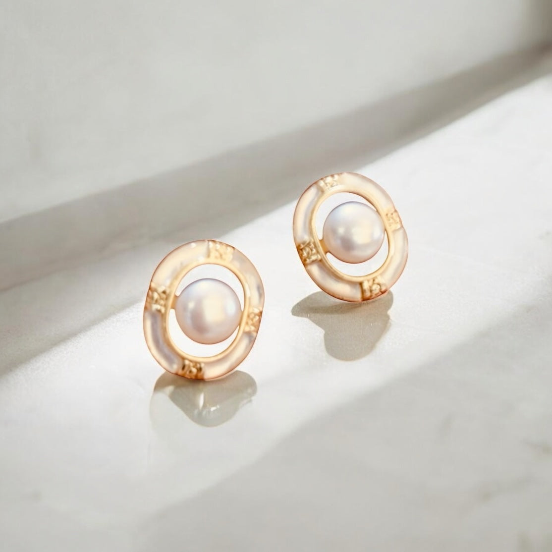 Oyster pearl framed earrings