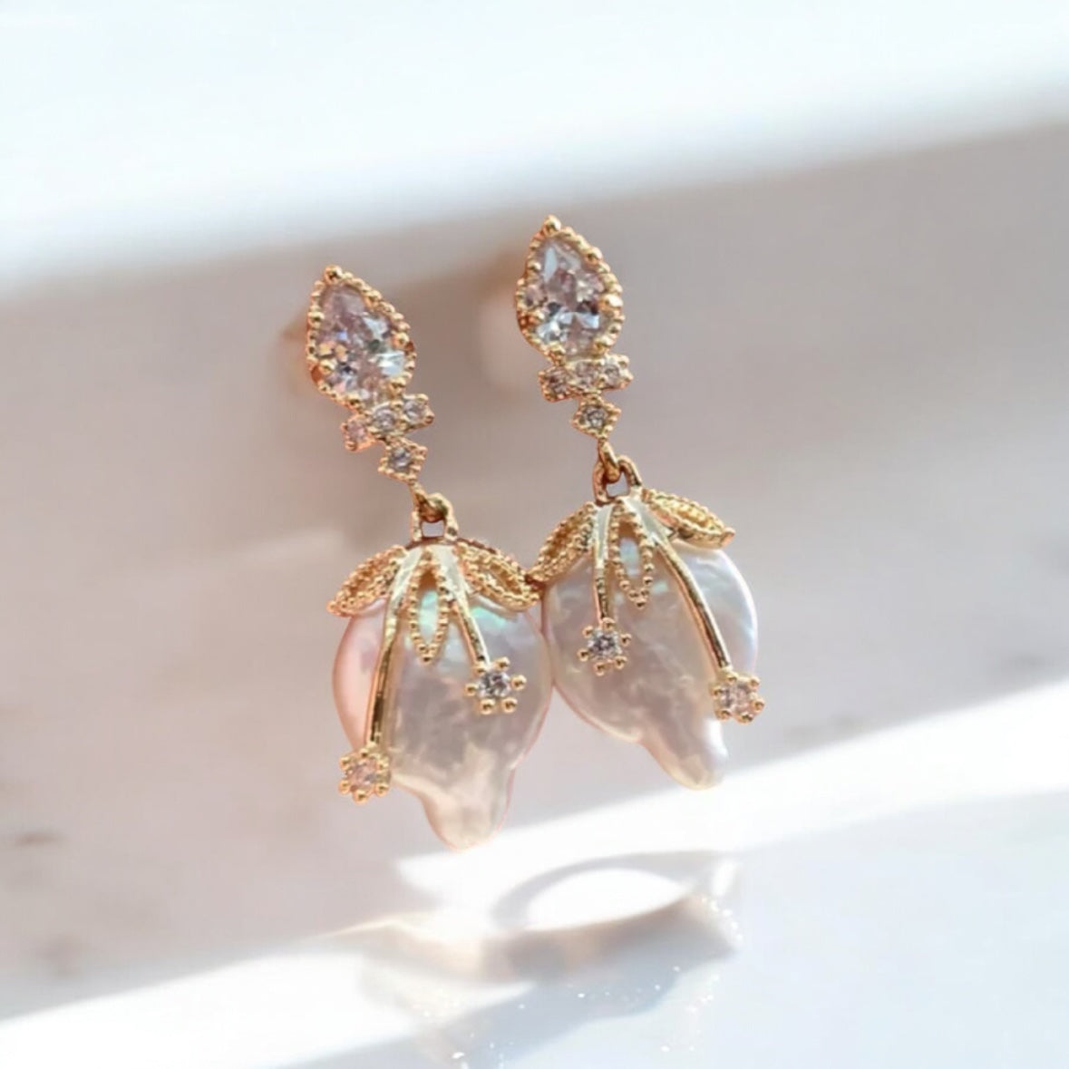 The diamond baroque pearl earrings