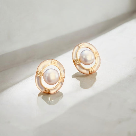 Oyster pearl framed earrings